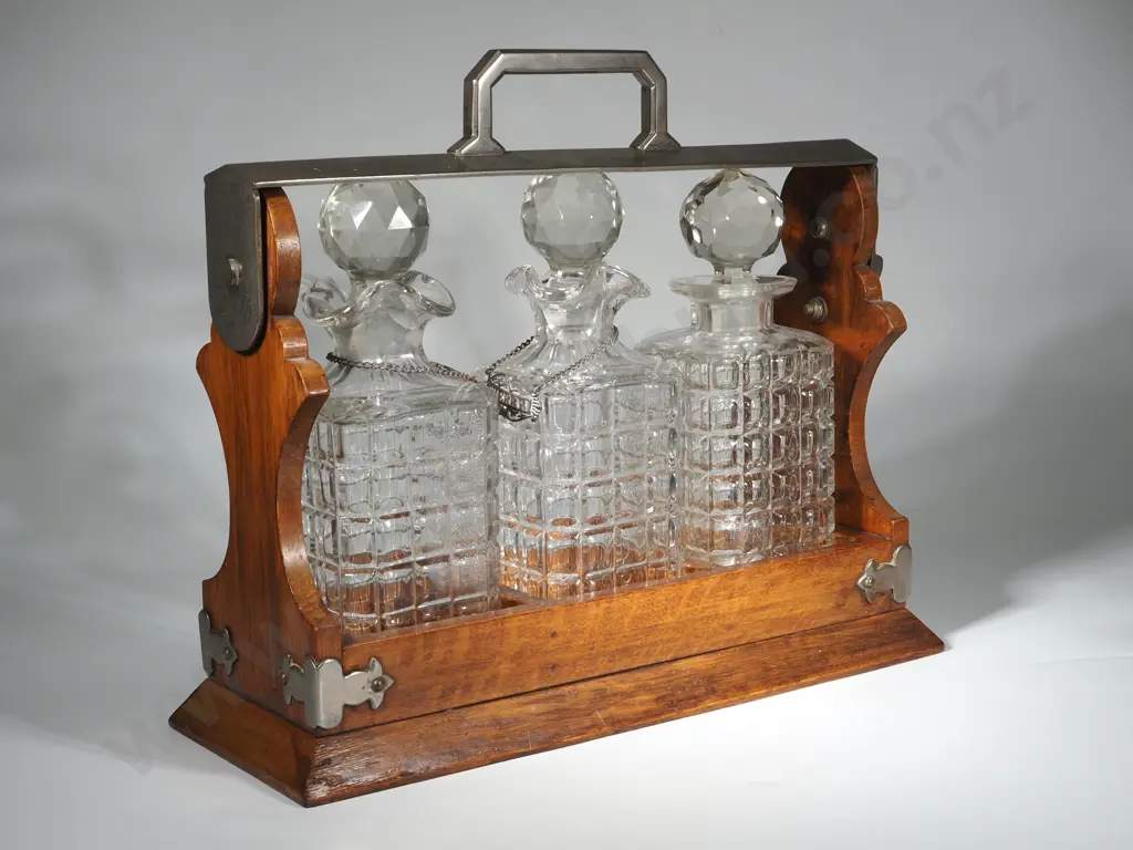 Three Bottle Tantalus in An Oak Case . Two Bottles Matching & With Labels. The Other Bottle A/F Image 1++