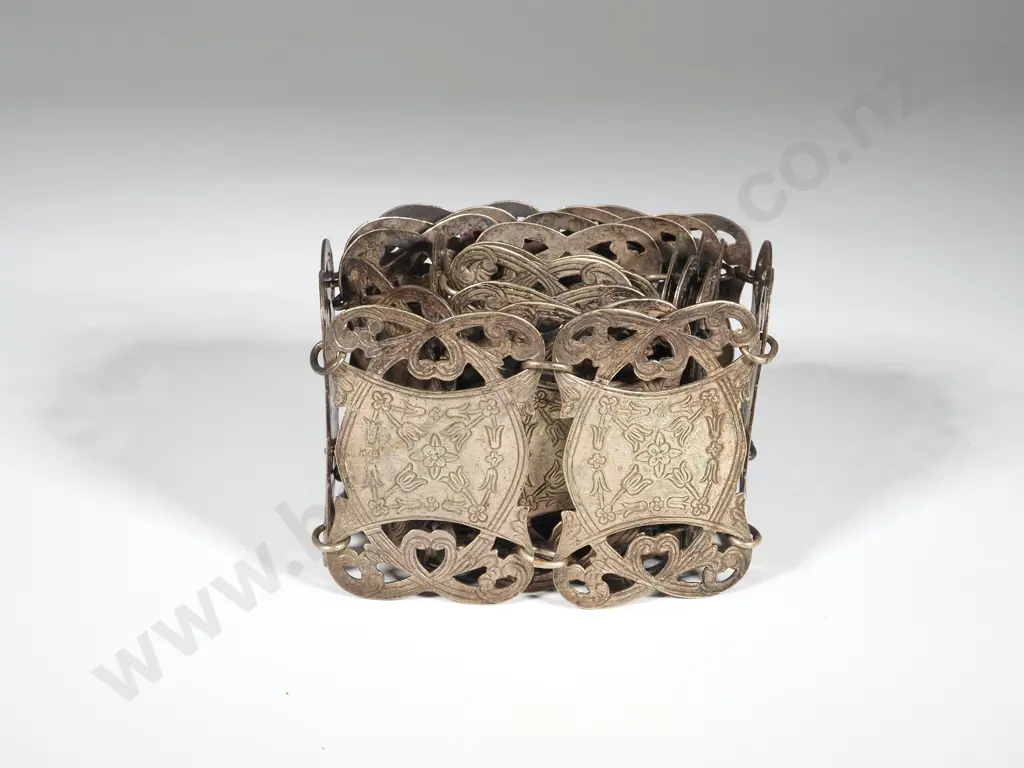 One Engraved S/P Belt Made in England. Image 1++