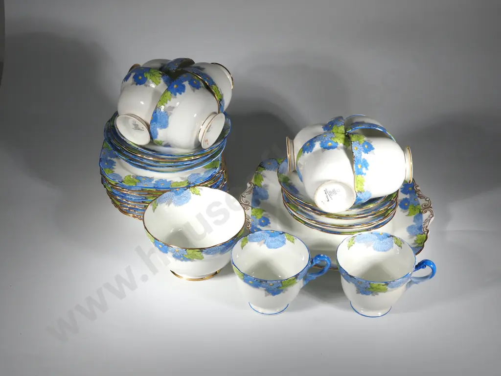 Paragon Chrysanthemum Tea Set including Ten Cups Of Varying Shapes, Ten Plates. Eleven Saucers, Cake Plate & Sugar Bowl Image 1++