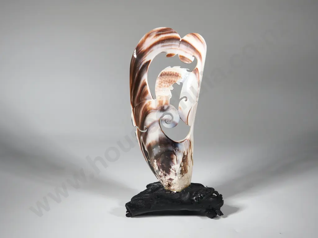 Carved Mussel Shell on Wooden Driftwood Base Image 1++