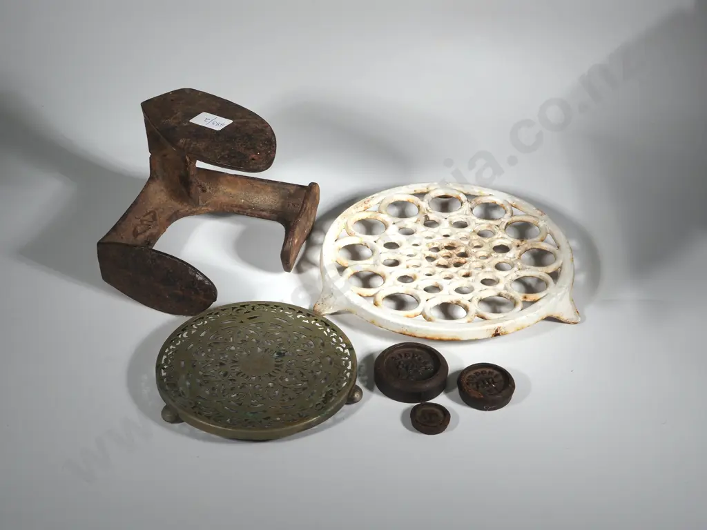 Box Containing Two Iron  Trivets & A Vintage Shoe Anvil  Image 1++