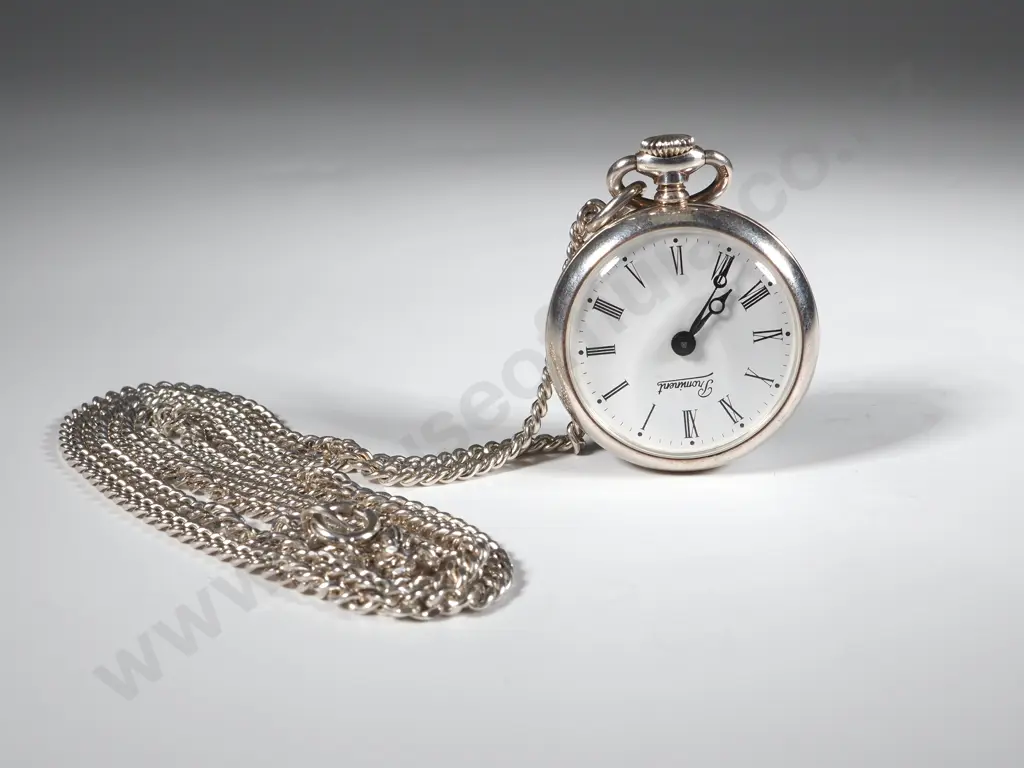Sterling Silver "Prominent" Fob Watch on Chain. The Back of the Watch with Embossed Floral Decoration Image 1++
