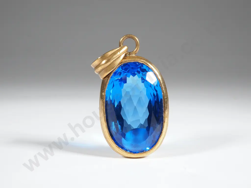 Oval Blue Sapphire Coloured Stone In Gold Plate Mount  Image 1++