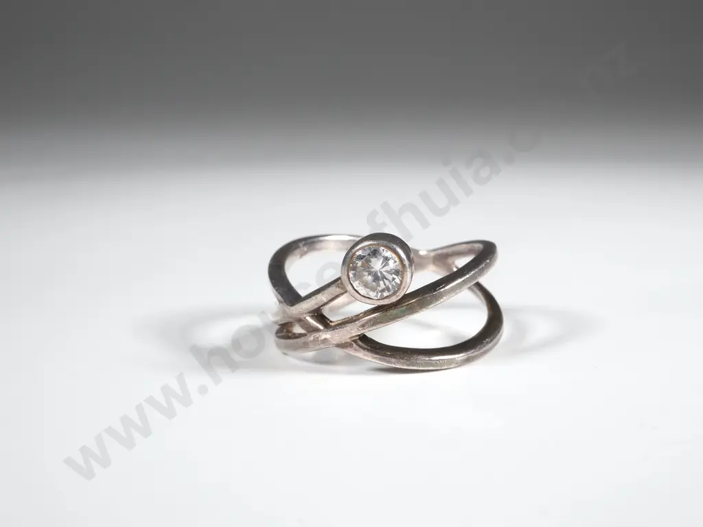 Sterling Silver Crossover Ring Set with a Single White Stone Image 1++