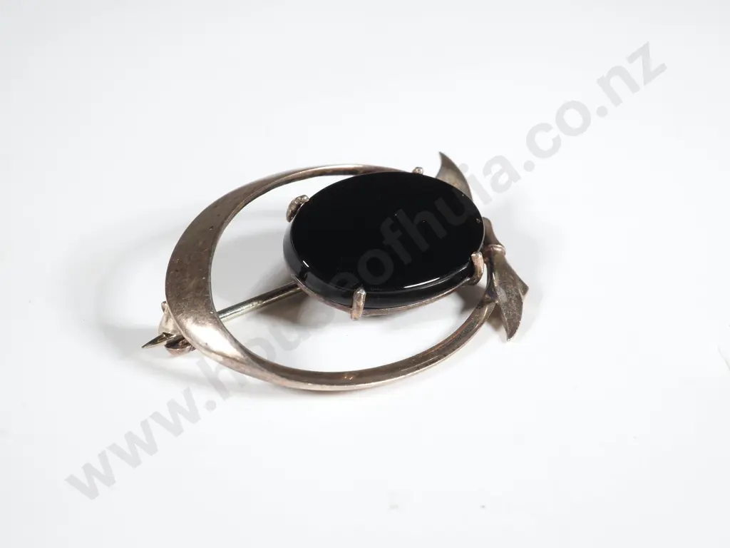 Oval Black Stone Brooch Suspended in a Sterling Silver Support with Bow Finial Image 1++