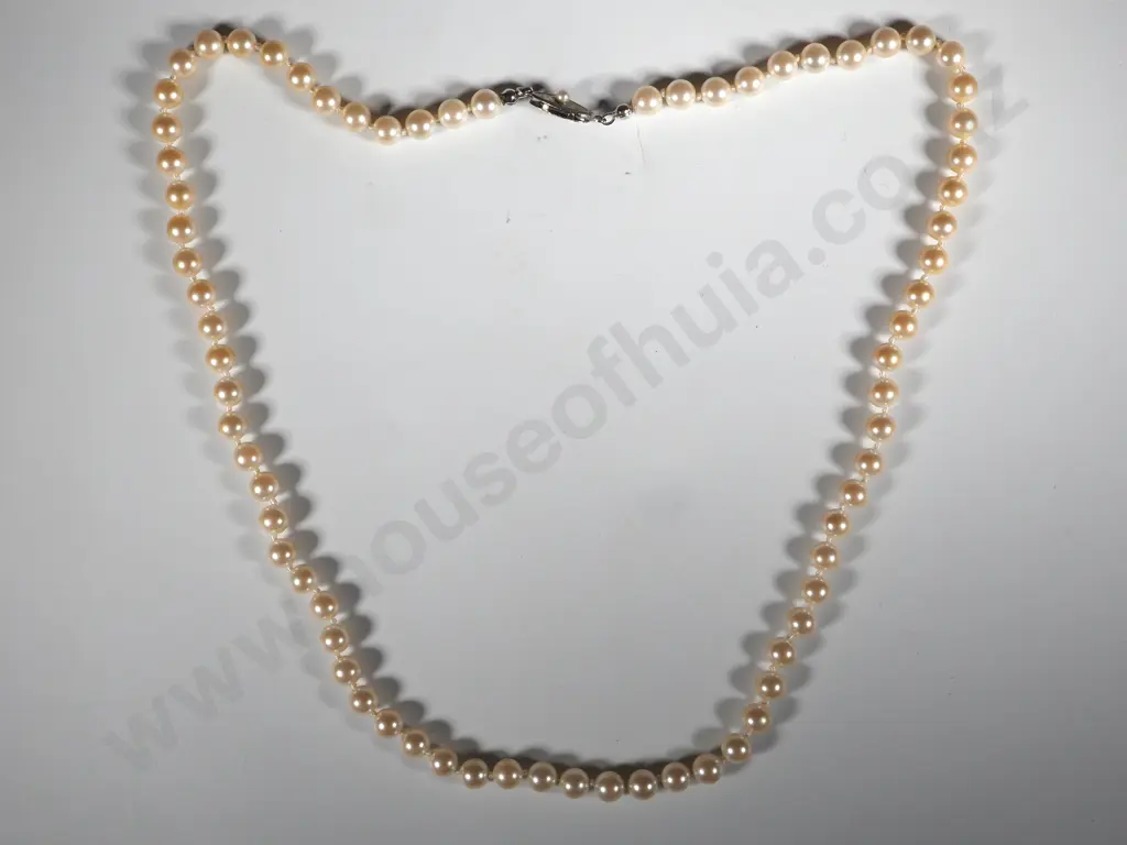 String Of Individually Knotted Pearls with Silver Clasp Image 1++
