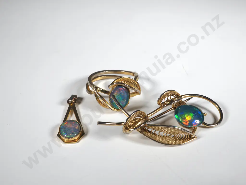 A Doublet Opal Ring, Brooch & Pendant Image 1++