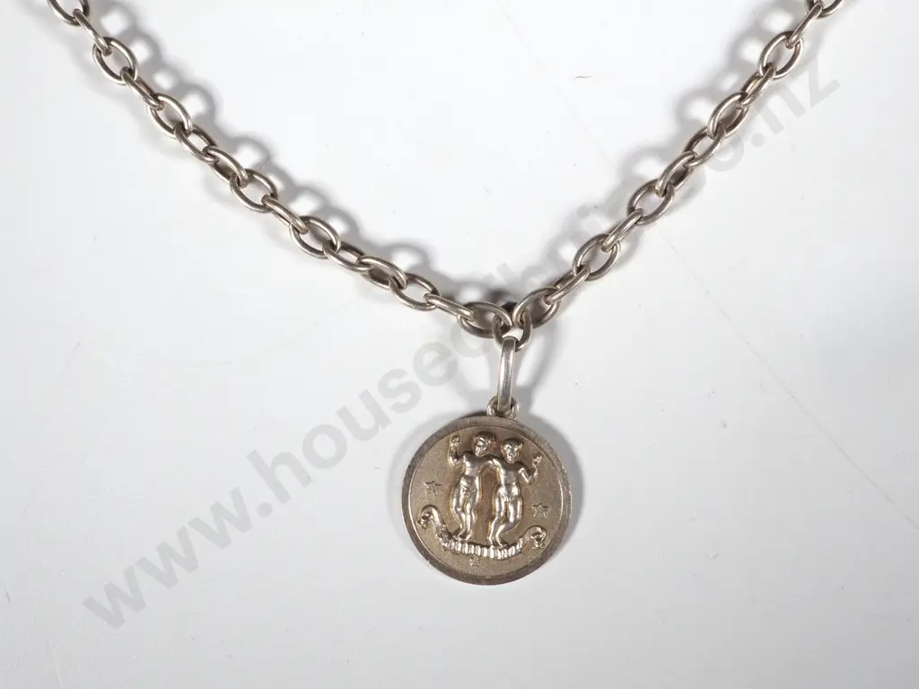 Sterling Silver Circular  Pendant Depicting Gemini's Twins On a Chain Image 1++