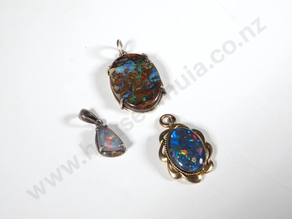 Three Opal Pendants Set In Sterling Silver. One with Silver Gilt.  Image 1++