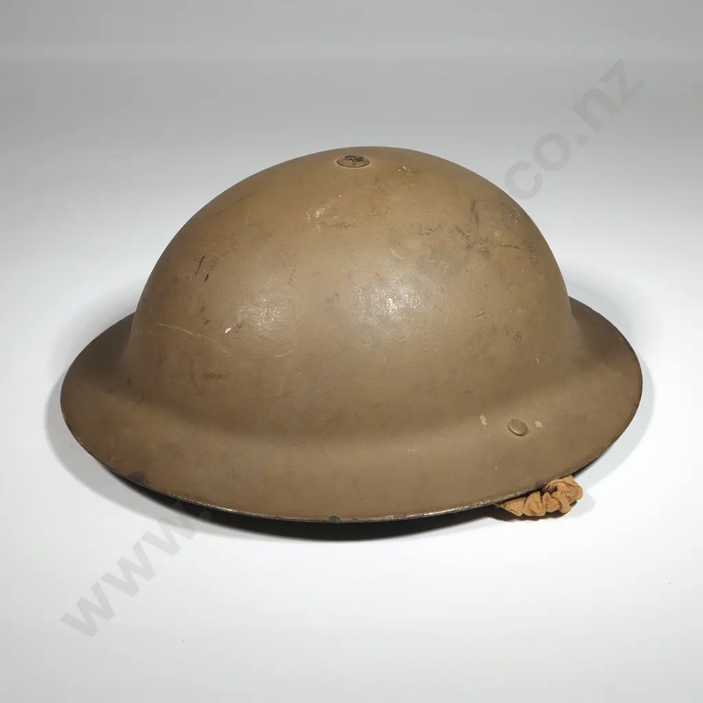 WWII Raw Edge Tin Helmet. Image 1++
