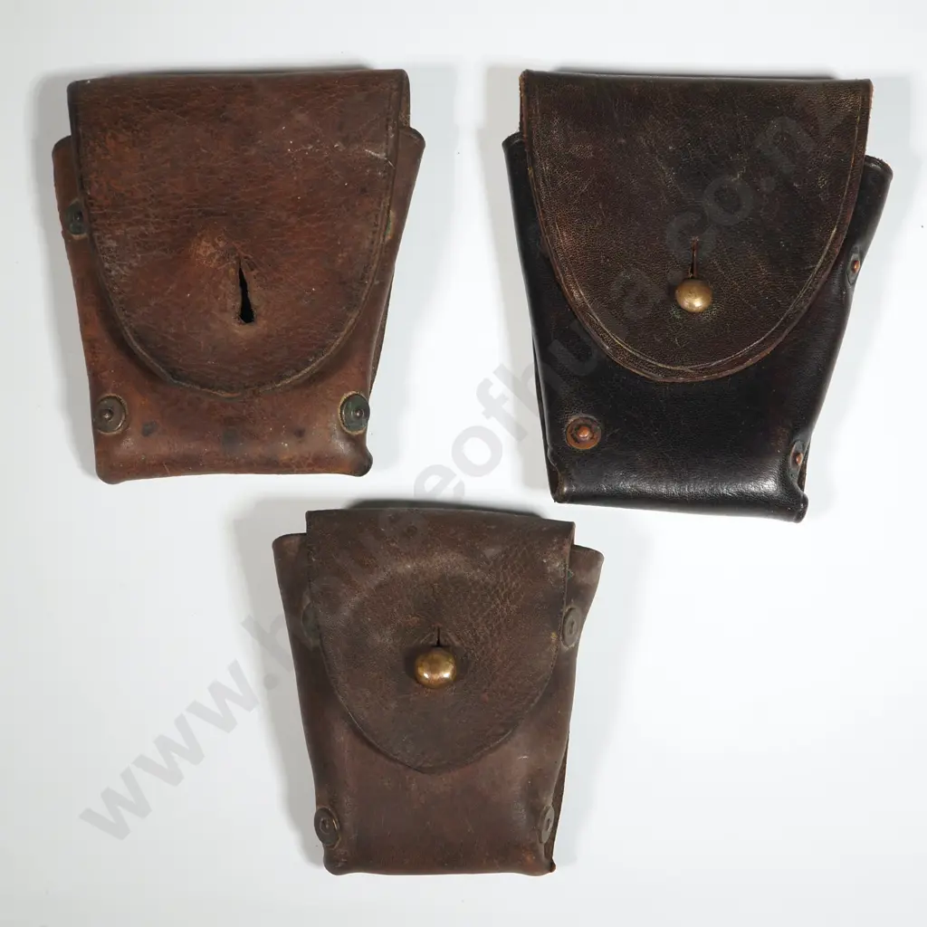 Three Assorted Leather Ammo Pouches. Image 1++