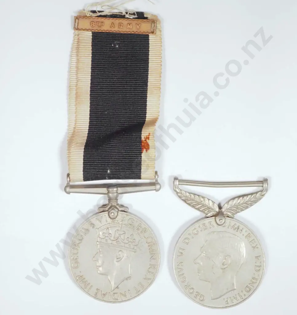 Two World War II Medals, The War Medal 1939 - 45 Wrong Ribbon & the New Zealand Service Medal No Ribbon Image 1++
