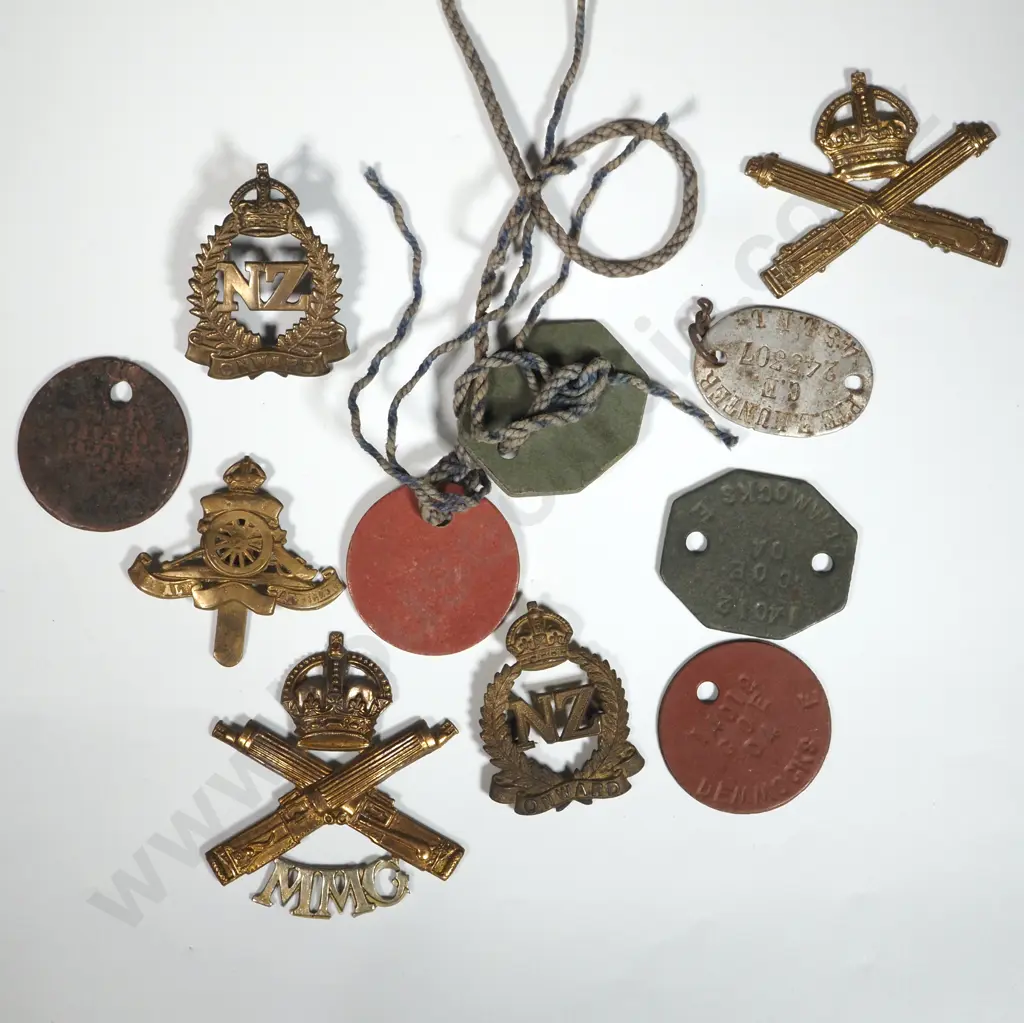 Miscellaneous Dog Tags & Machine Gun Badges. Image 1++