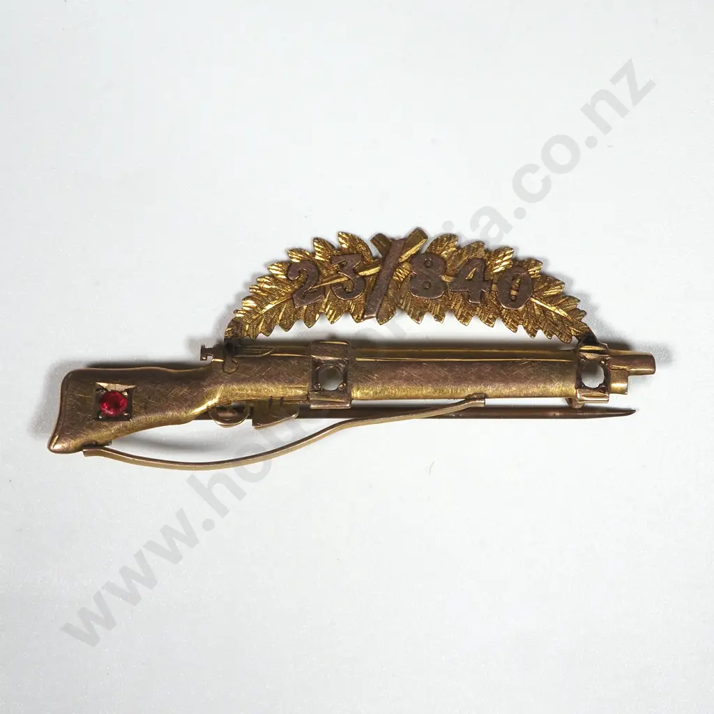 WWI 9ct Gold Rifle Sweetheart Badge 23/840 on Fern Leaf - Two Gems Missing. Image 1++