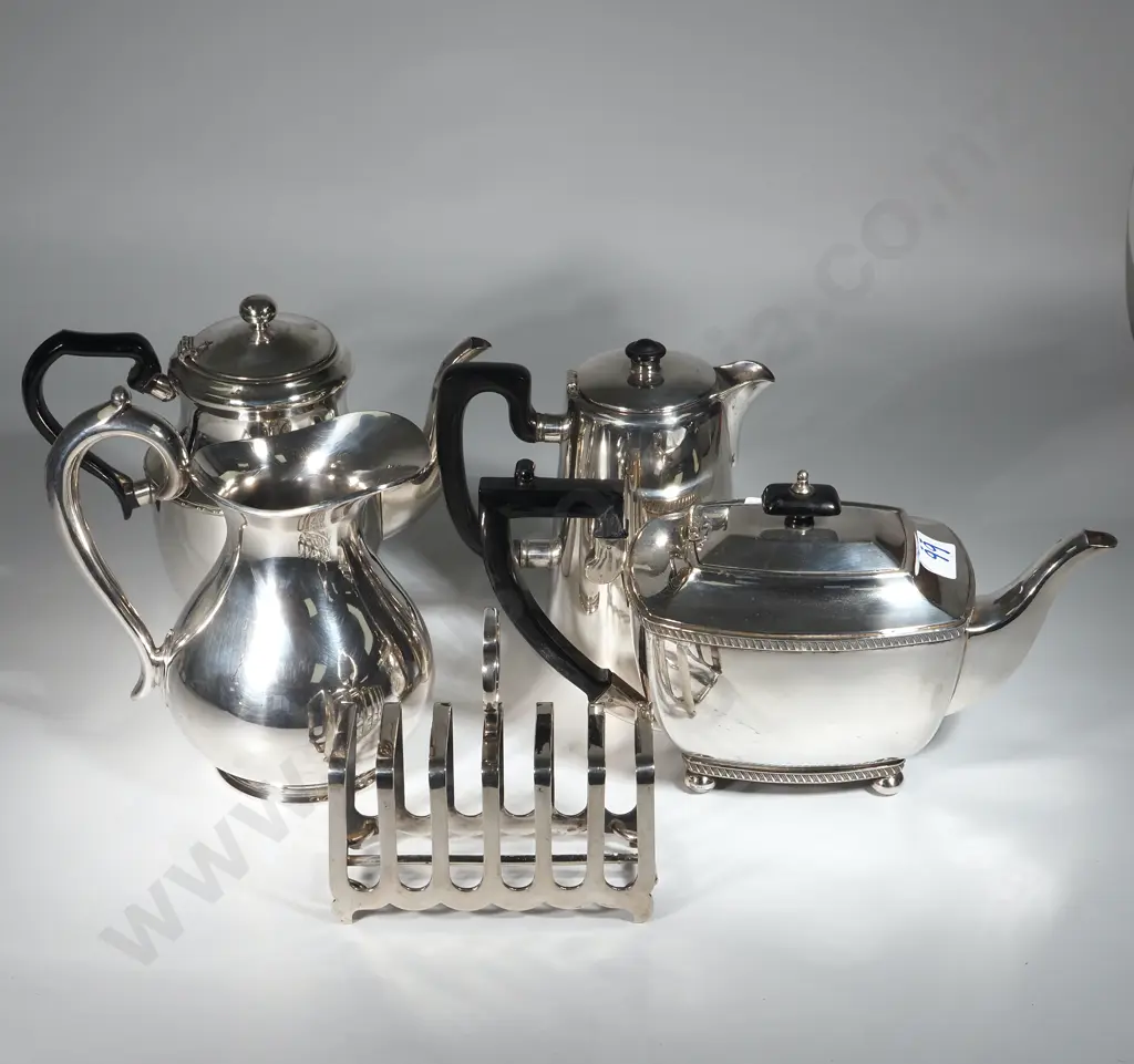 Silver Plate Items To Include Two Teapots & Two Jugs & A Toast Rack Image 1++