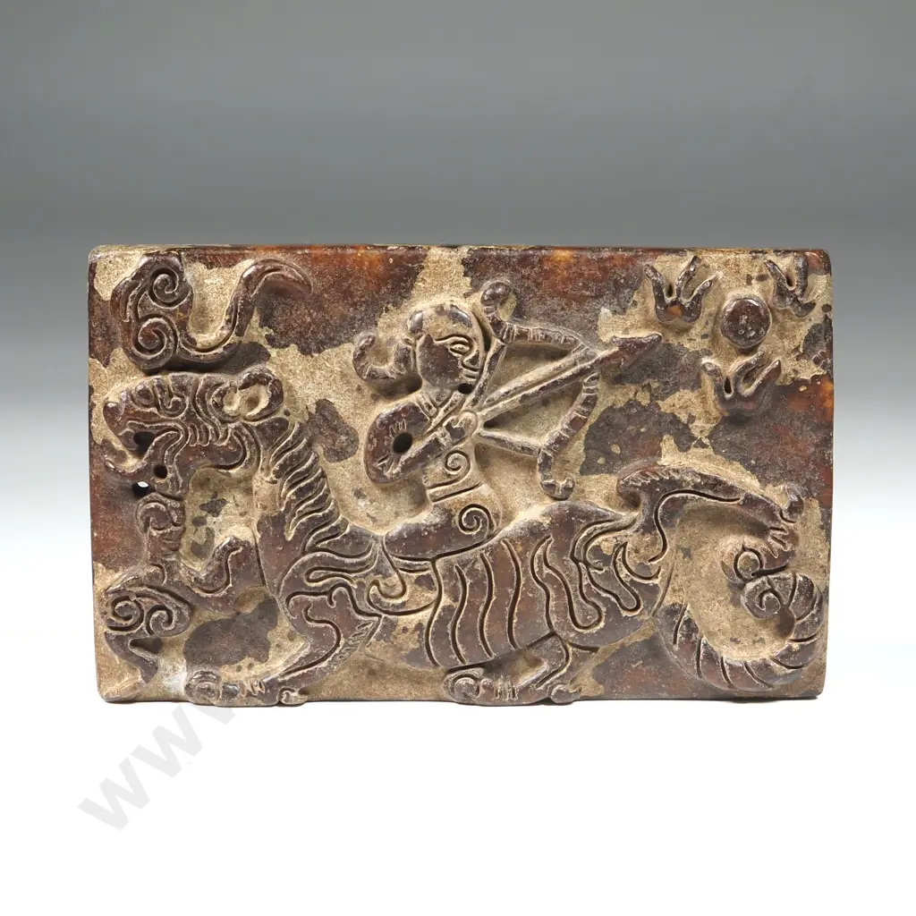 Rectangular Carved Stone Featuring A Design That Appears To Be A Stylized Dragon Or Mythical Beast. Image 1++
