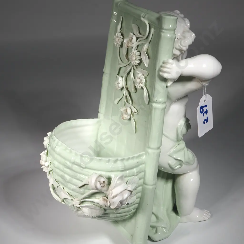 Antique Celadon & White Porcelain Spill Vase In The Form Of A Cherub Carrying A Basket.Possibly Minton Porcelain, Image 1++