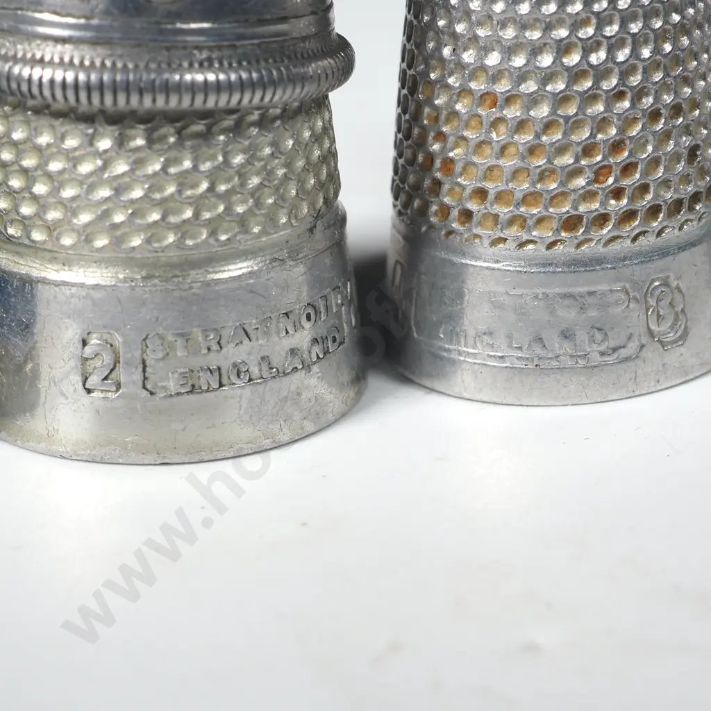 Nine White Metal Advertising Thimbles Image 1++