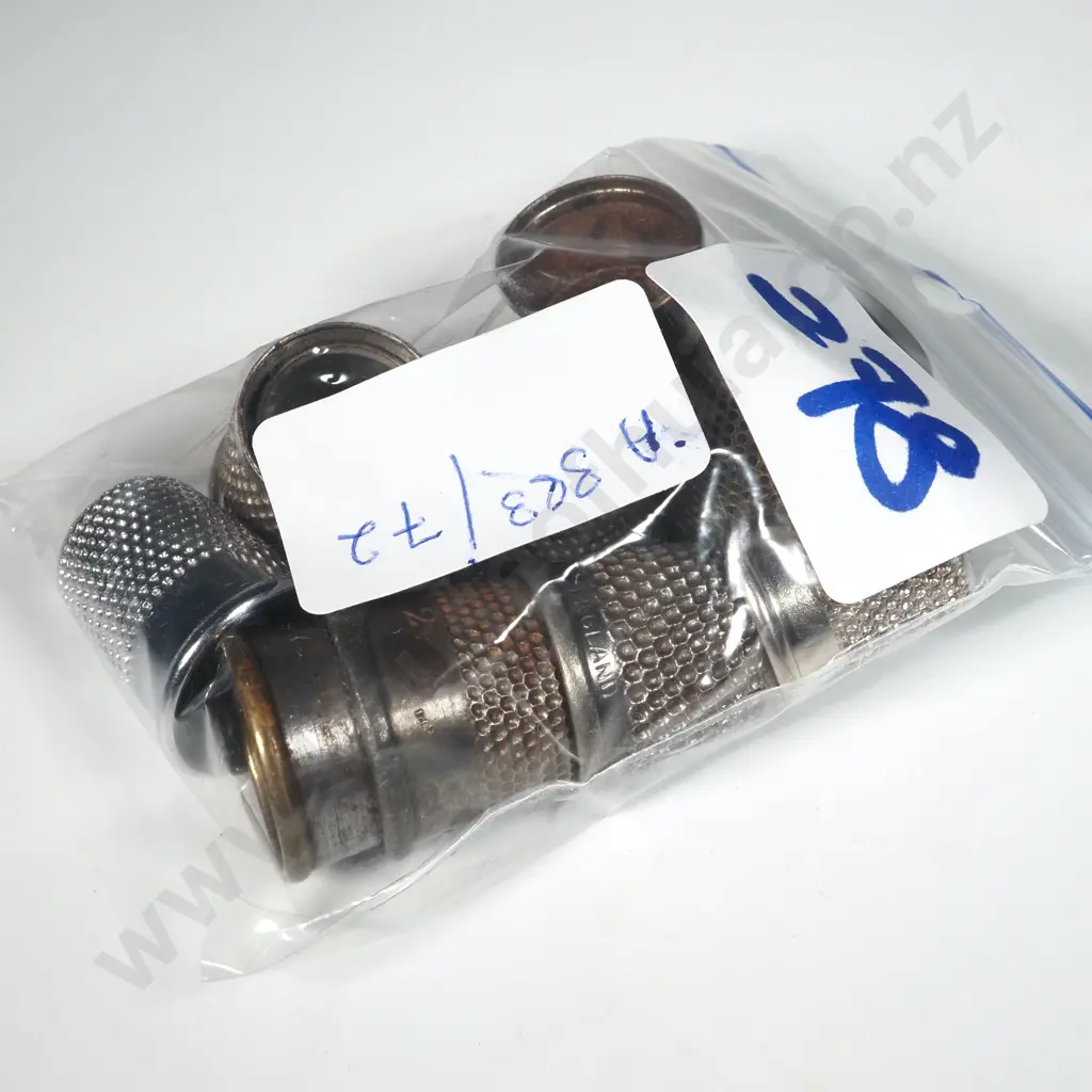 Ten Metal Thimbles, Including One with Thumb Print  Image 1++