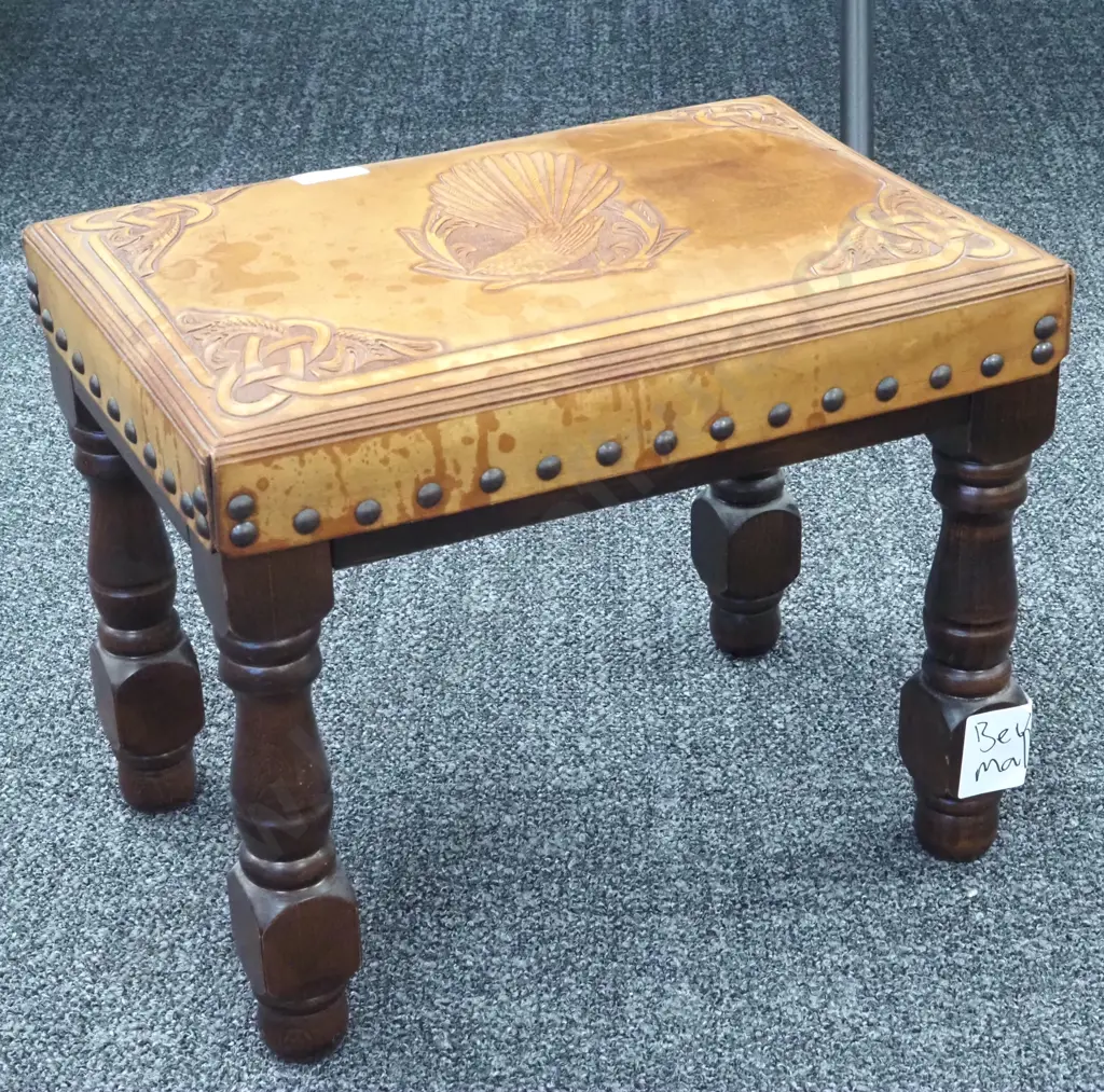 Wood & Leather Footstool On Four Turned Legs with Tooled Leather Top Depicting A Fantail.  Image 1++