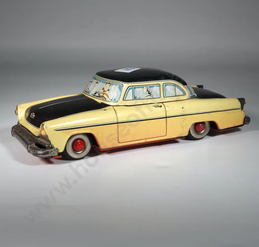 1950s Nakamura Yellow/Black Friction Drive Plymouth Hardtop. Image 1++