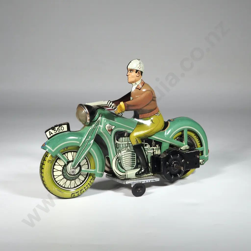 1950's Mechanical Pressed Tin Arnold Green A560 Motorcycle. Image 1++