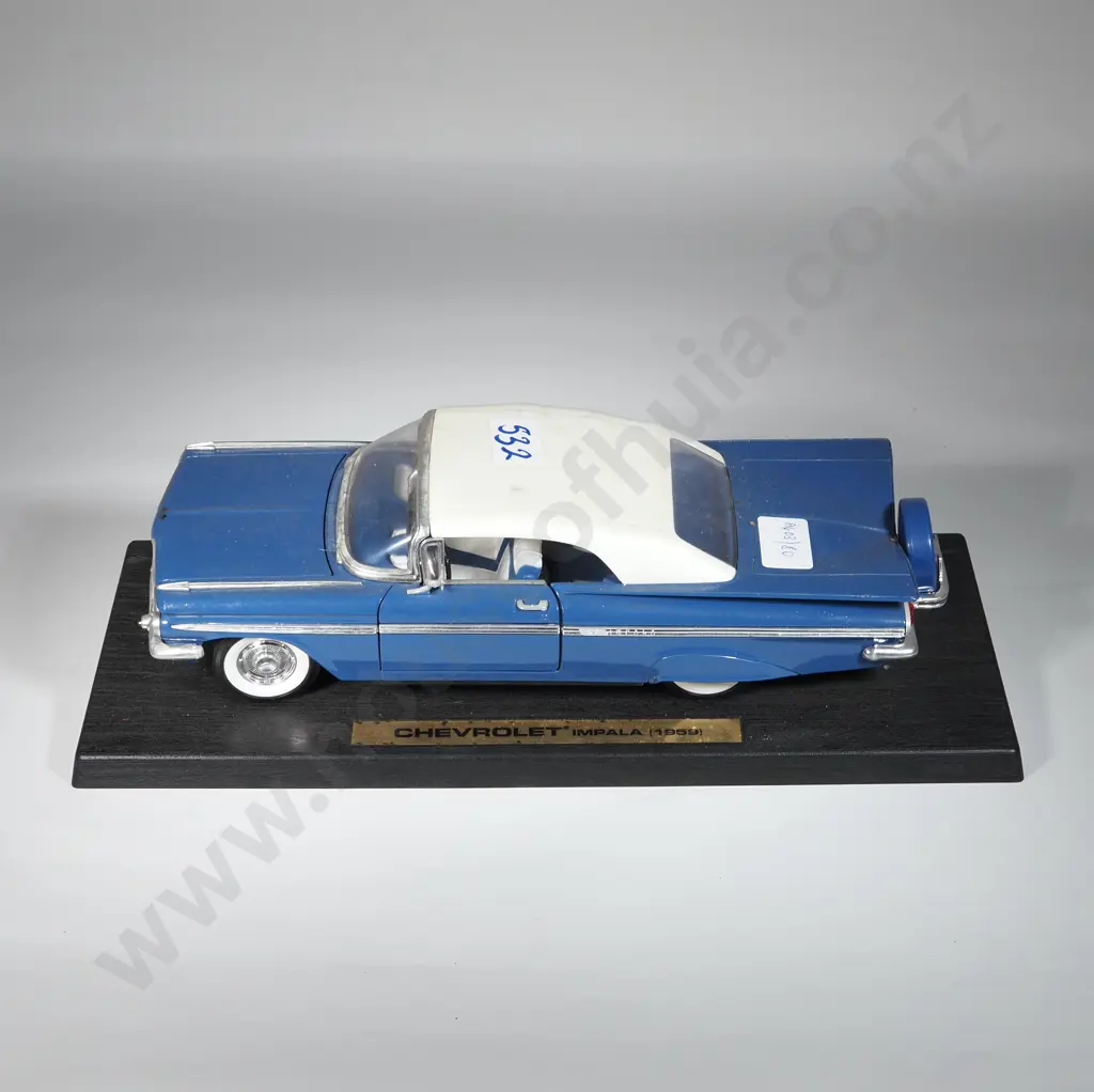 Diecast 1:18 Scale Model Of A 159 Chevrolet Impala. Some Car Windows Missing Image 1++