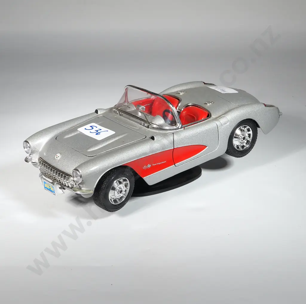 Burago 1:18 Scale Diecast Model Of A 1957 Chevrolet Corvette ; Diamond Series In Silver & Red Image 1++