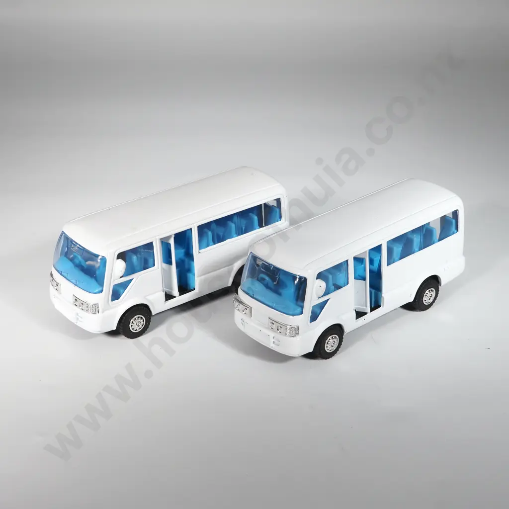Two White Diecast Model Passenger Vans. Image 1++