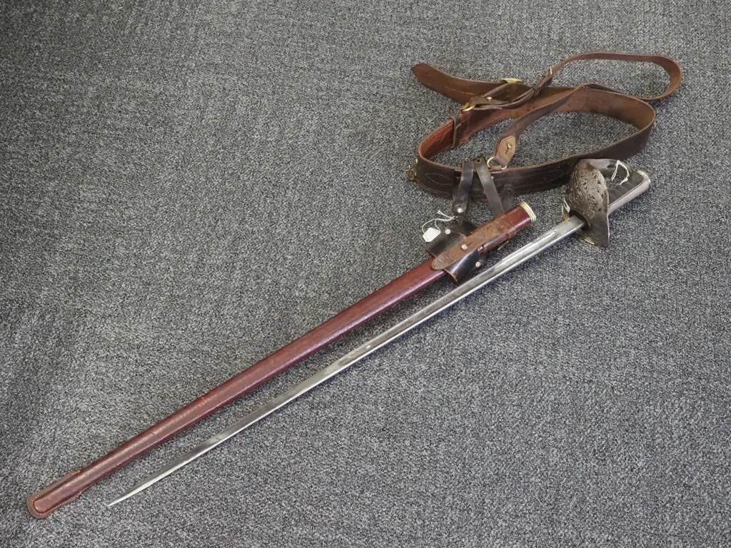 1898 Pattern Infantry Sword - George V. Made by Wilkinson. Leather Scabbard & Sam Brown Belt & Frog. Image 1++