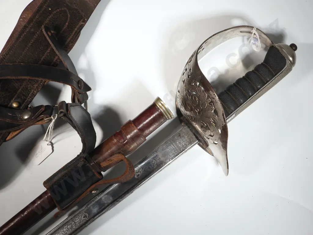 1898 Pattern Infantry Sword - George V. Made by Wilkinson. Leather Scabbard & Sam Brown Belt & Frog. Image 1++