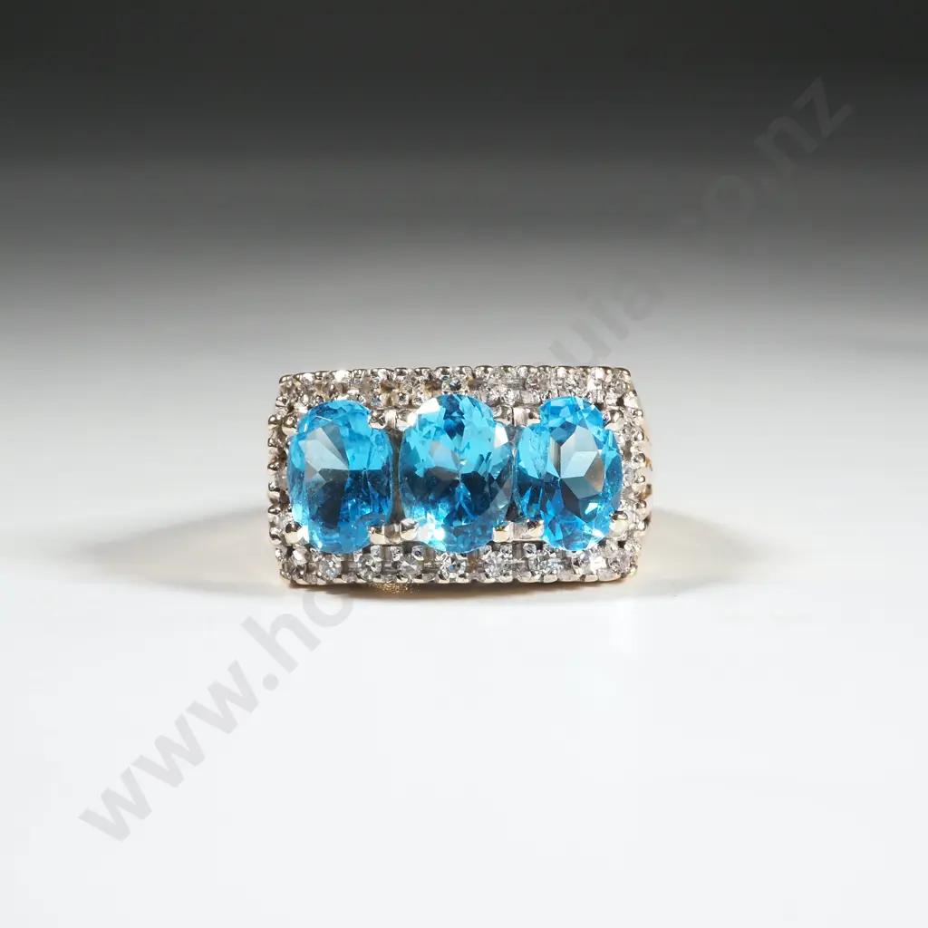9ct Gold Blue Topaz  Bridge Set Ring Image 1++