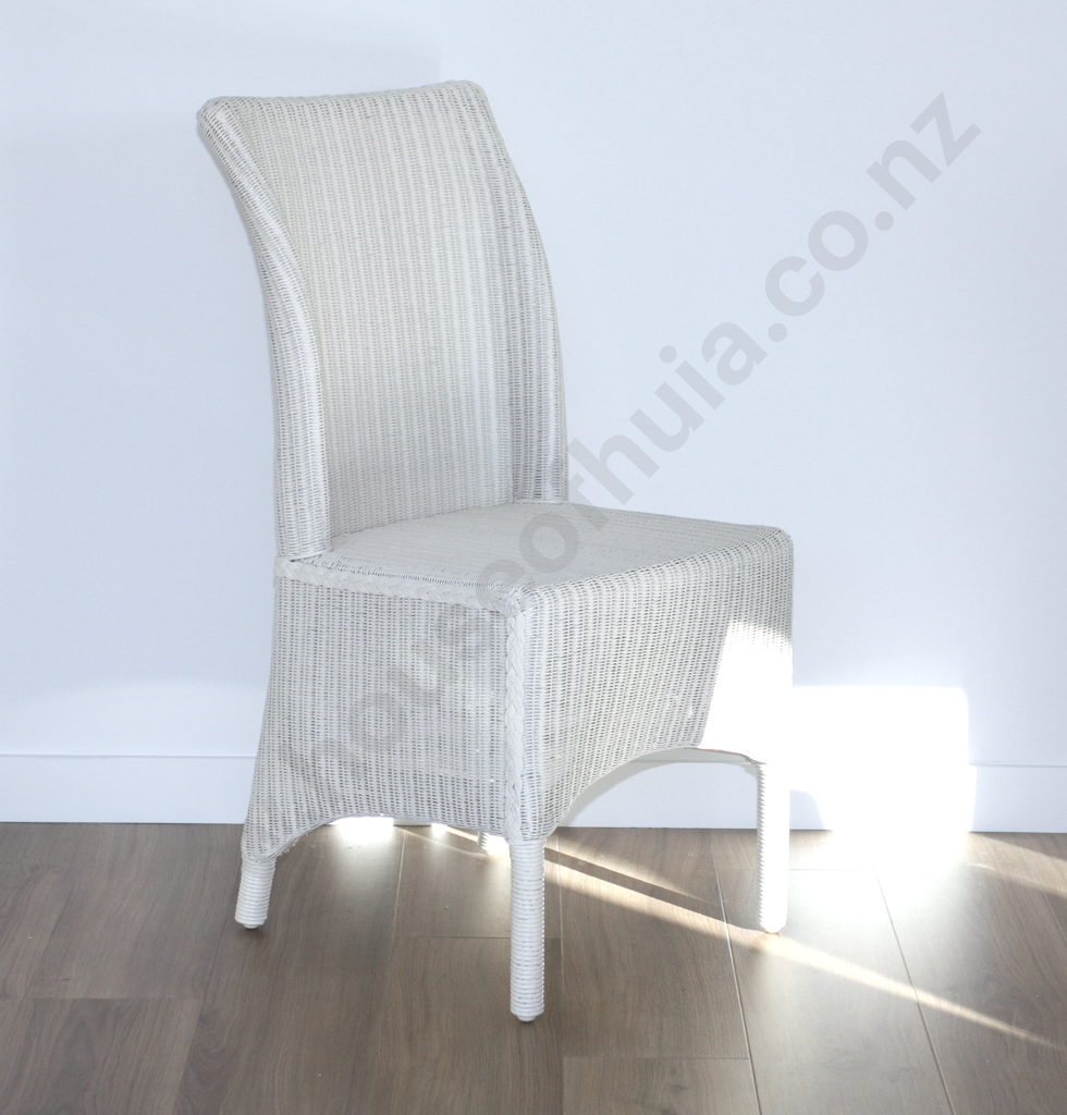 Four White Wicker Chairs Image 1++