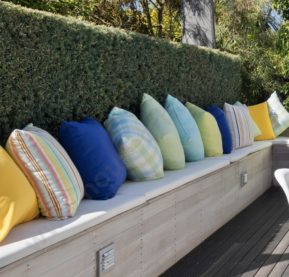 A Set of Nine Coloured Outdoor Cushions Image 1++