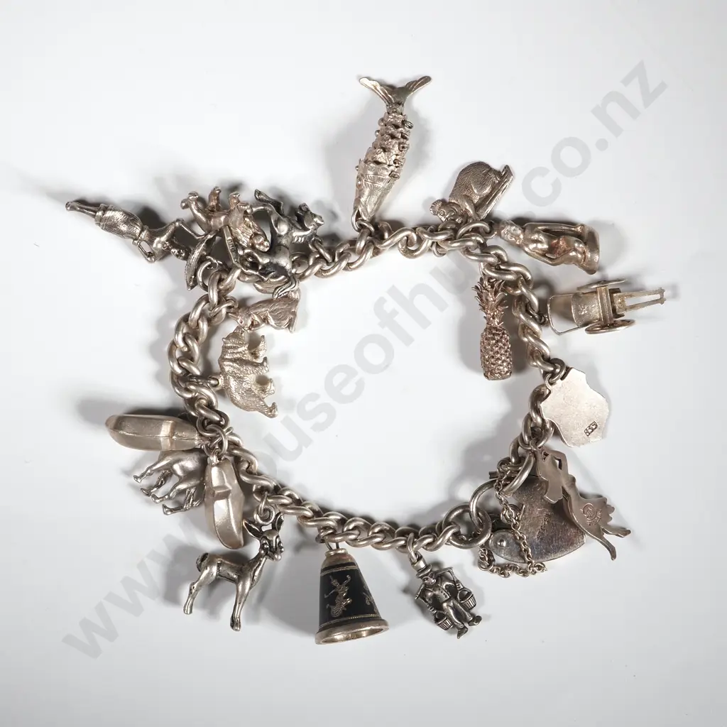 Heavy Sterling Silver Charm Bracelet with Fourteen Various Charms Image 1++