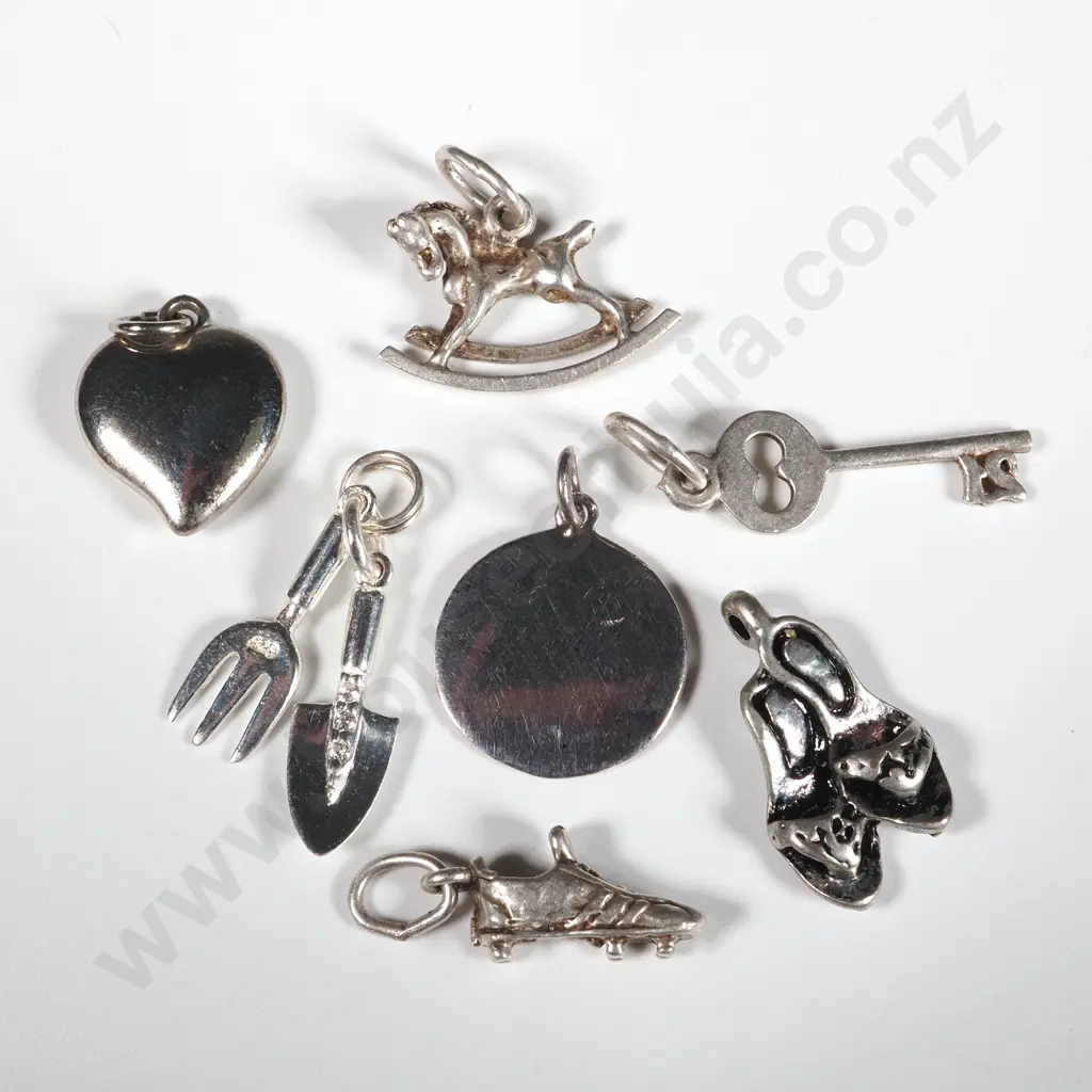 Seven Sterling Silver Charms Image 1++