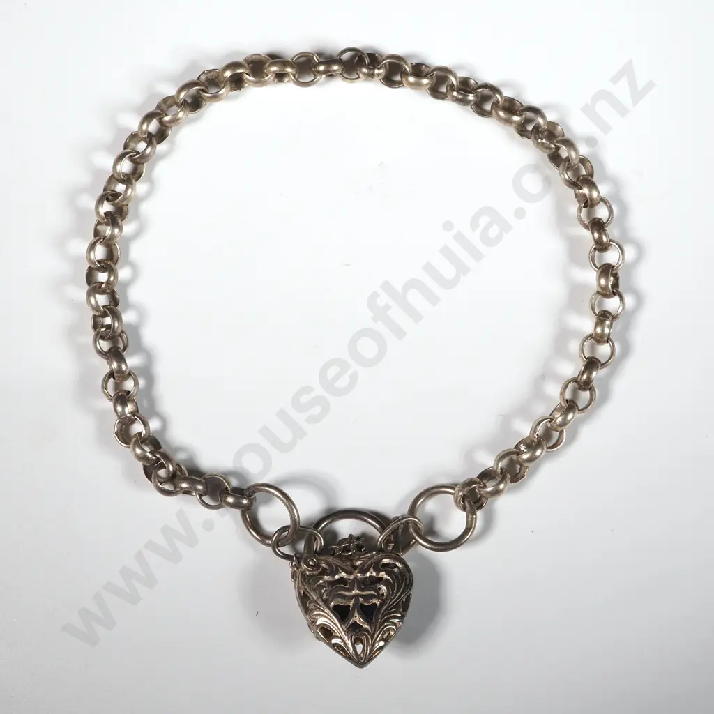 Sterling Silver Chain Bracelet with Heart Shaped Filigree Locket Set With A Purple Stone Image 1++