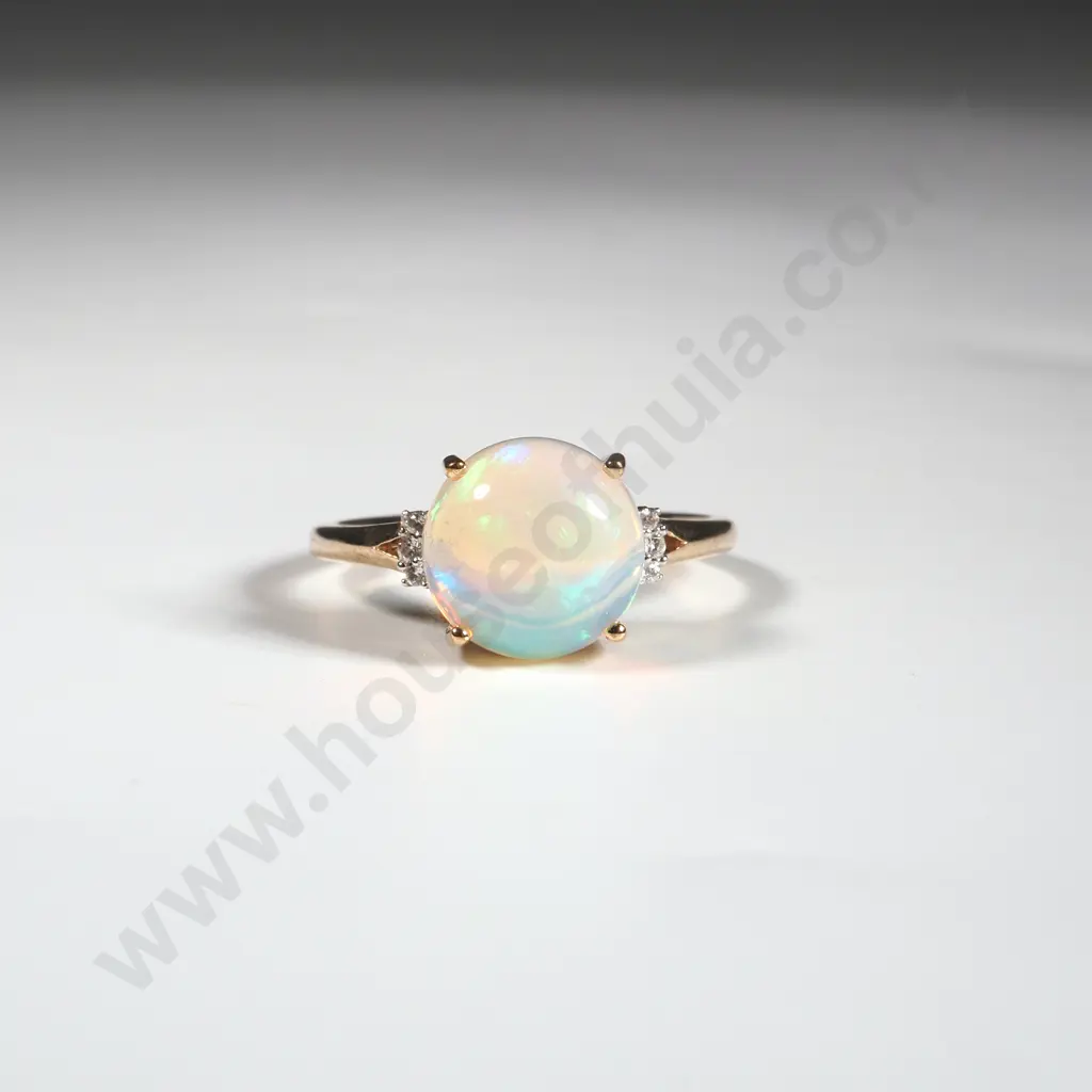 9ct Gold & Opal Ring. The Single Cabochon Opal Flanked By Diamonds Image 1++