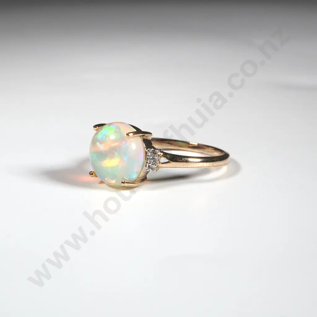 9ct Gold & Opal Ring. The Single Cabochon Opal Flanked By Diamonds Image 1++