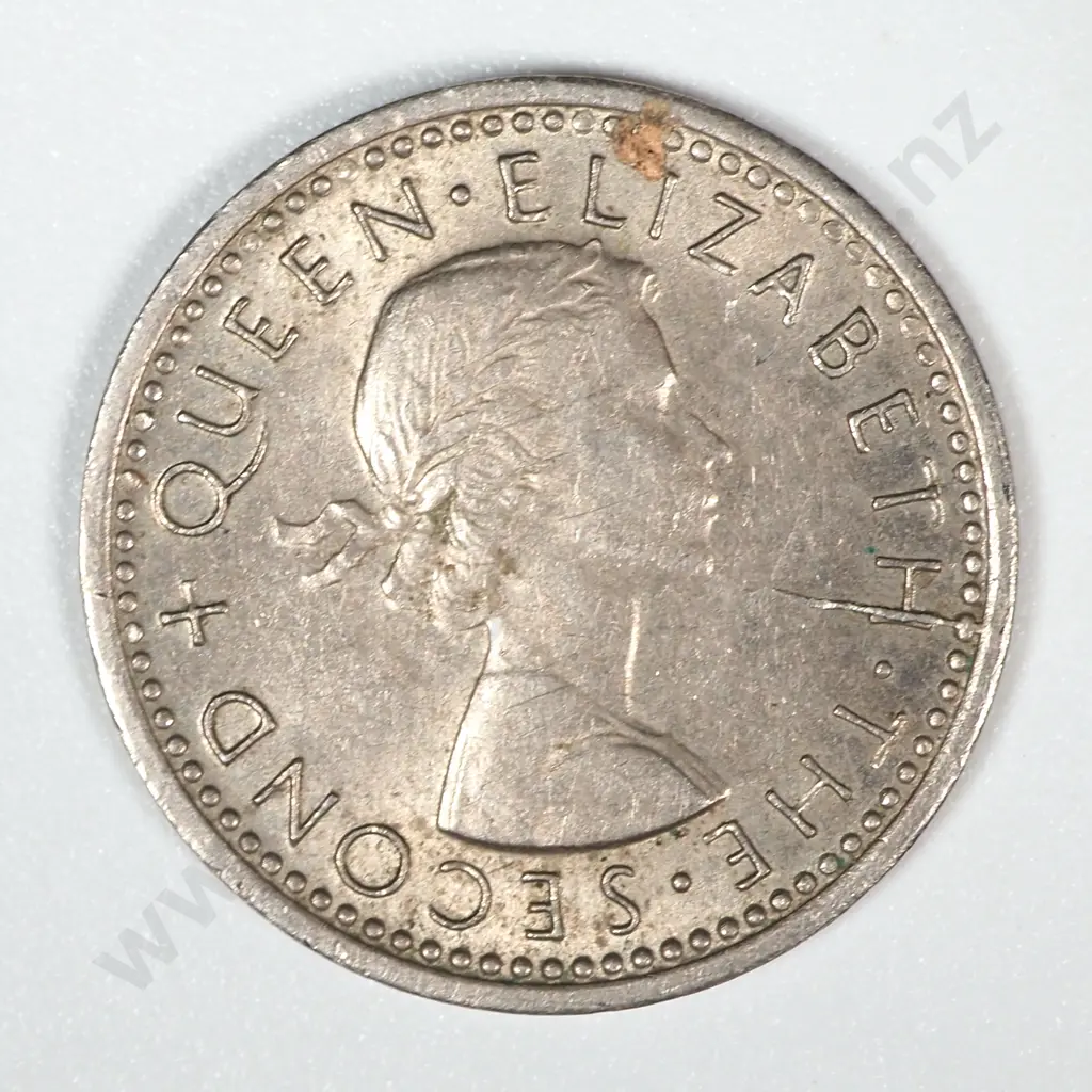 Error Coin: 1964 New Zealand Elizabeth II Threepence w Split Planchet Image 1++