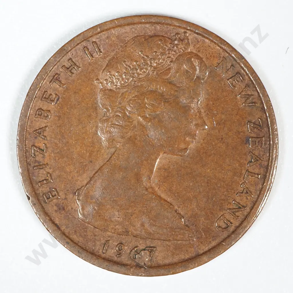 Error Coin: 1967 New Zealand Elizabeth II One Cent w Extra Metal Between 6 & 7 Image 1++