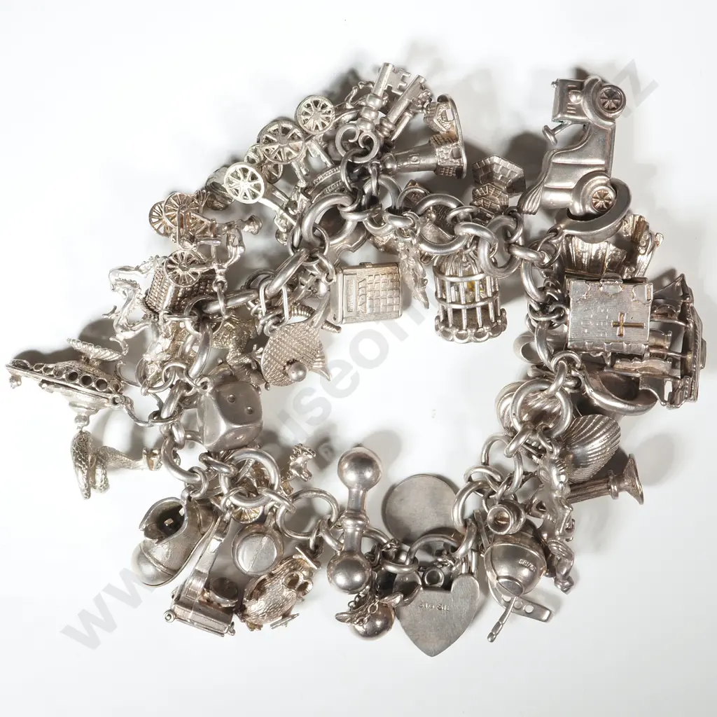Exceptionally Large Sterling Silver Charm Bracelet Image 1++