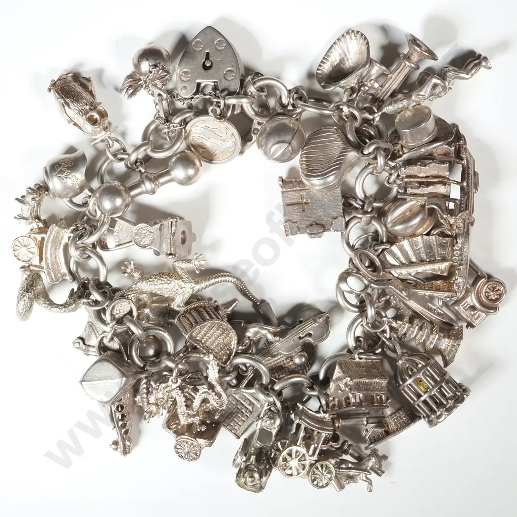 Exceptionally Large Sterling Silver Charm Bracelet Image 1++