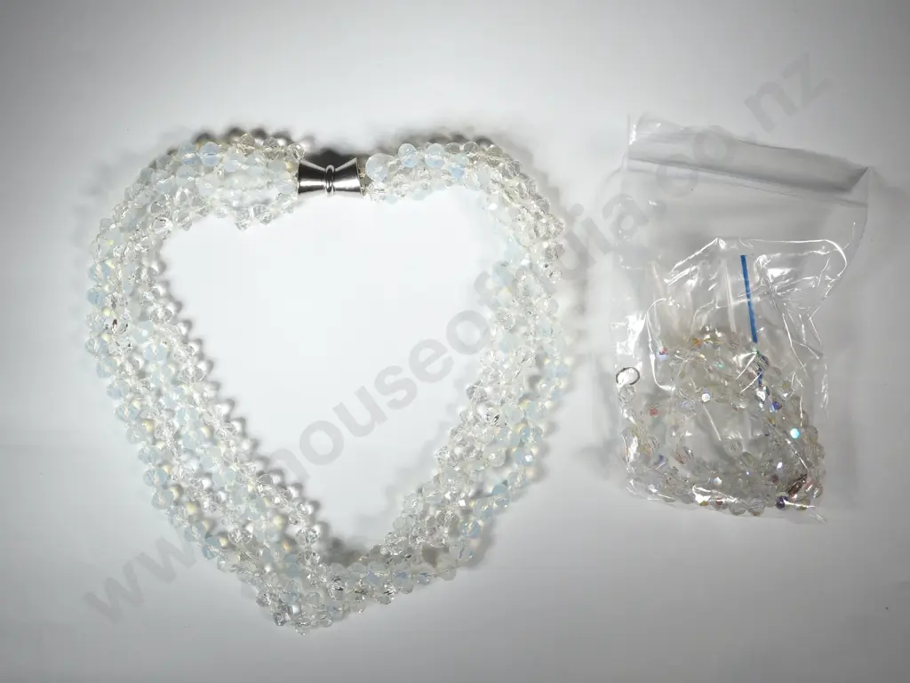 Two Crystal Necklaces, One Three Stand & One w Matching Earrings. Image 1++