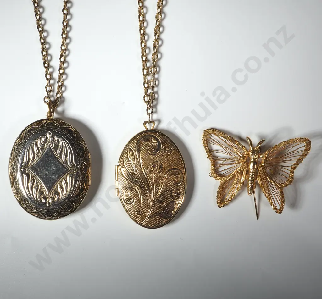 Two Gold Coloured Lockets & Chains & Butterfly Brooch. Image 1++