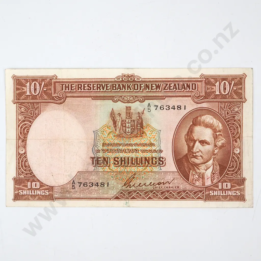 TEN SHILLINGS, WILSON SIGNATURE, SERIAL A OVER 5 763481 ( FIRST PREFIX OF SIGNATURE ), GOOD FINE, ESTIMATED C.V. $550 Image 1++