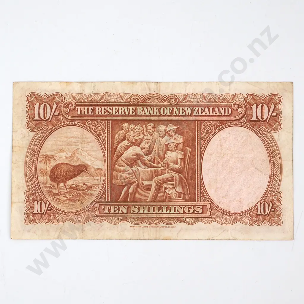 TEN SHILLINGS, WILSON SIGNATURE, SERIAL 0C 139941, VERY GOOD, C.V. $60 Image 1++