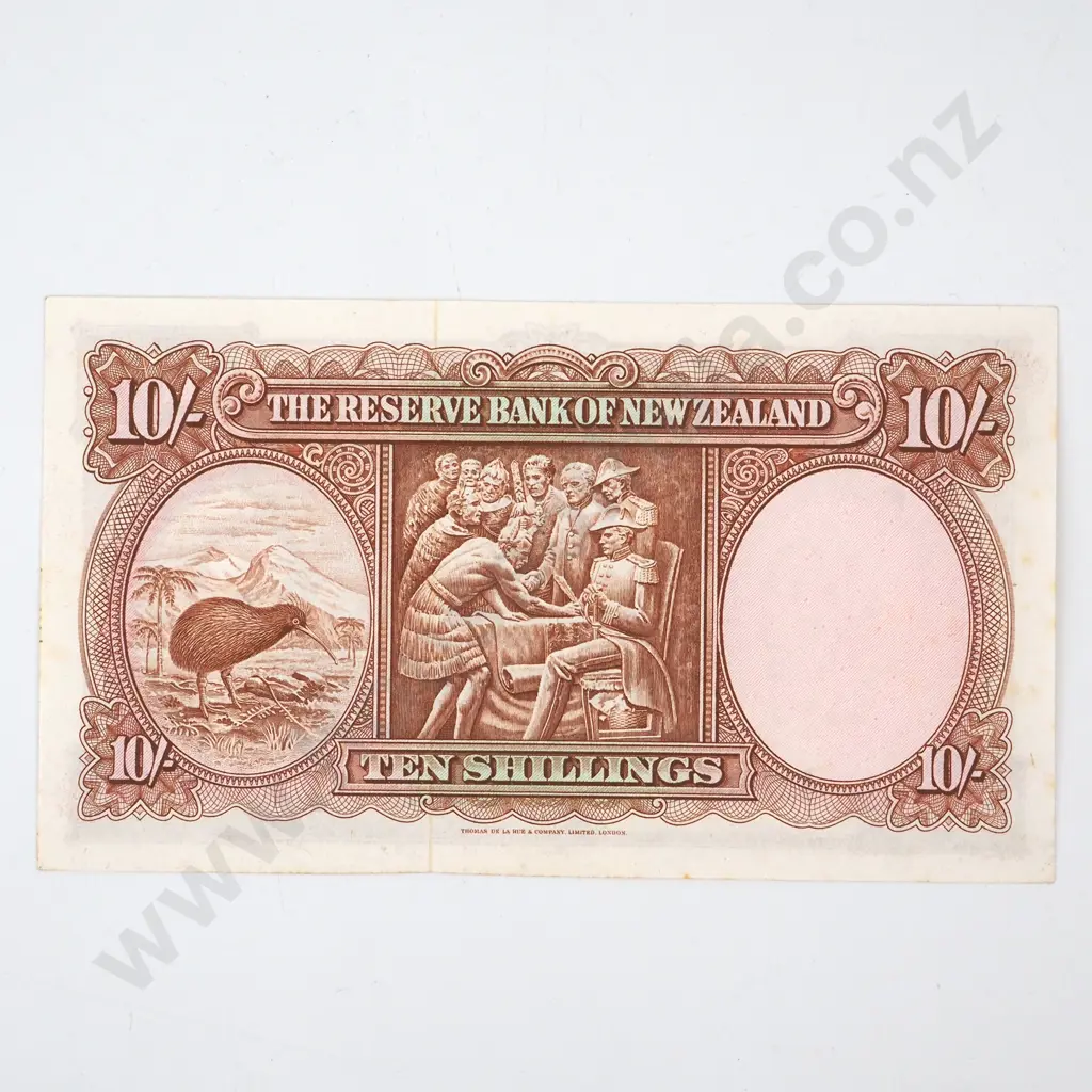 TEN SHILLINGS, FLEMING SIGNATURE, SERIAL 4S 888002, ALMOST UNCIRCULATED, C.V. $130 Image 1++