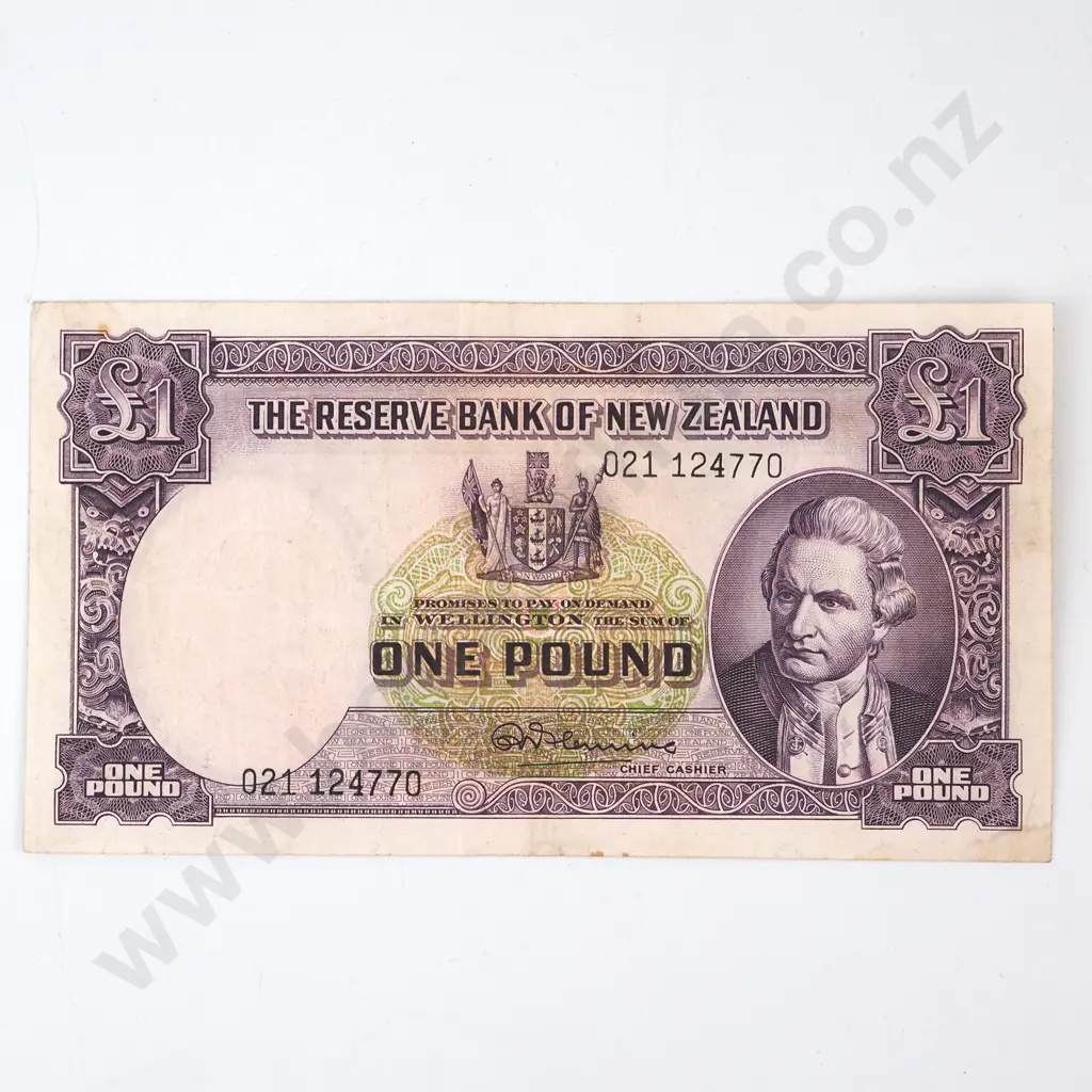 ONE POUND, FLEMING SIGNATURE, SERIAL 021 124770 ( FIRST PREFIX OF SIGNATURE ), VERY FINE, C.V. $600 Image 1++