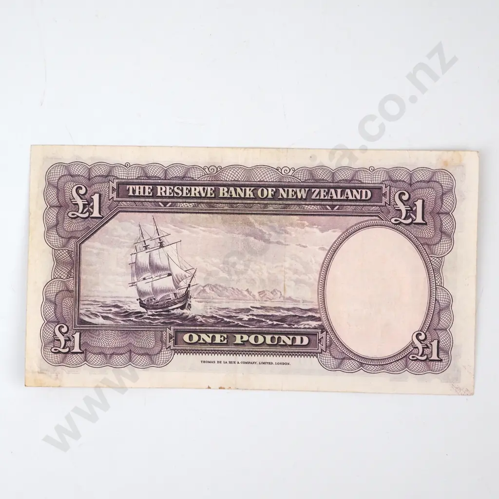 ONE POUND, FLEMING SIGNATURE, SERIAL 021 124770 ( FIRST PREFIX OF SIGNATURE ), VERY FINE, C.V. $600 Image 1++